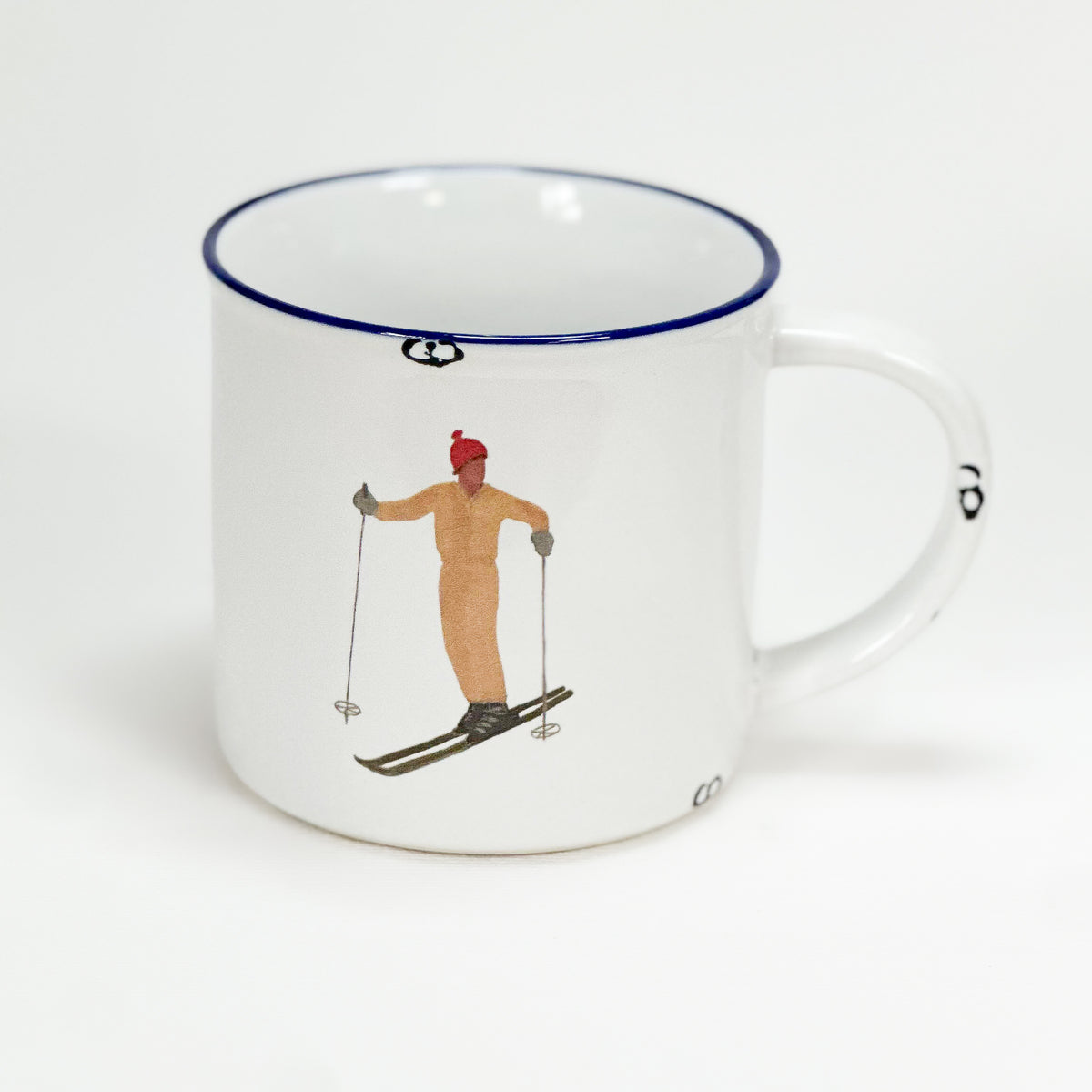 Keramiktasse im Emaille- Look, 460 ml, mit Schifahrer im gelben Schianzug - Bild 1