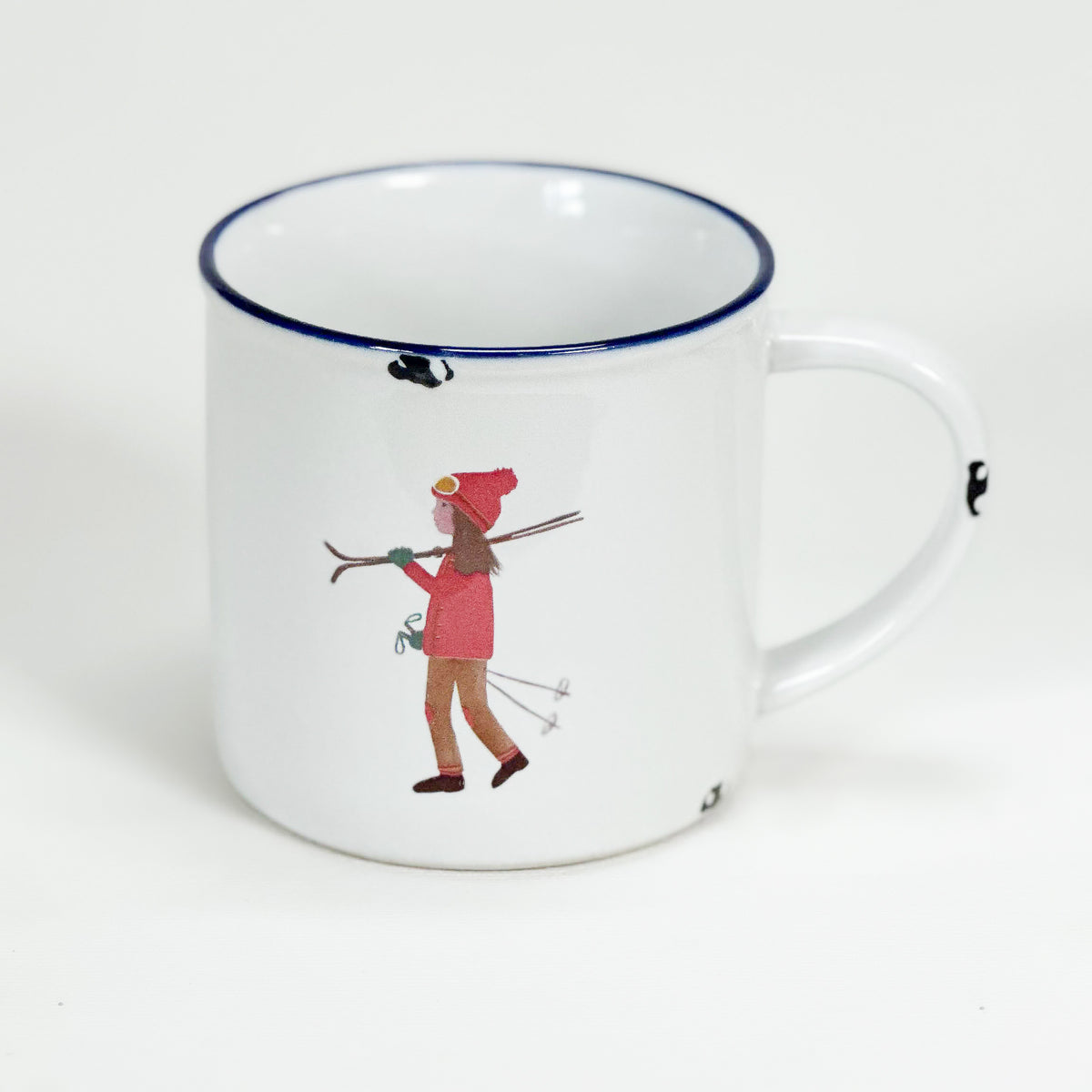 Vintage Keramiktasse im Emaille-look mit einem Skifahrer-Mädchen
